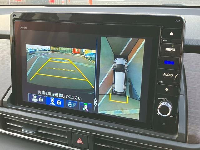 オデッセイハイブリッド ｅ：ＨＥＶアブソルート・ＥＸ　純正１０インチナビ　全周囲カメラ　フルセグＴＶ　Ｂｌｕｅｔｏｏｔｈ　純正後部座席モニター　ＡＣＣ　ドラレコ　両側電動スライドドア　パワーバックドア　Ｐシート　シートヒーター　Ｐアシスト　オットマン（11枚目）