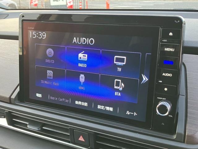 オデッセイハイブリッド ｅ：ＨＥＶアブソルート・ＥＸ　純正１０インチナビ　全周囲カメラ　フルセグＴＶ　Ｂｌｕｅｔｏｏｔｈ　純正後部座席モニター　ＡＣＣ　ドラレコ　両側電動スライドドア　パワーバックドア　Ｐシート　シートヒーター　Ｐアシスト　オットマン（12枚目）