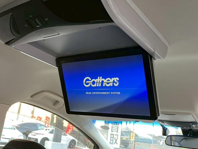 オデッセイハイブリッド ｅ：ＨＥＶアブソルート・ＥＸ　純正１０インチナビ　全周囲カメラ　フルセグＴＶ　Ｂｌｕｅｔｏｏｔｈ　純正後部座席モニター　ＡＣＣ　ドラレコ　両側電動スライドドア　パワーバックドア　Ｐシート　シートヒーター　Ｐアシスト　オットマン（13枚目）