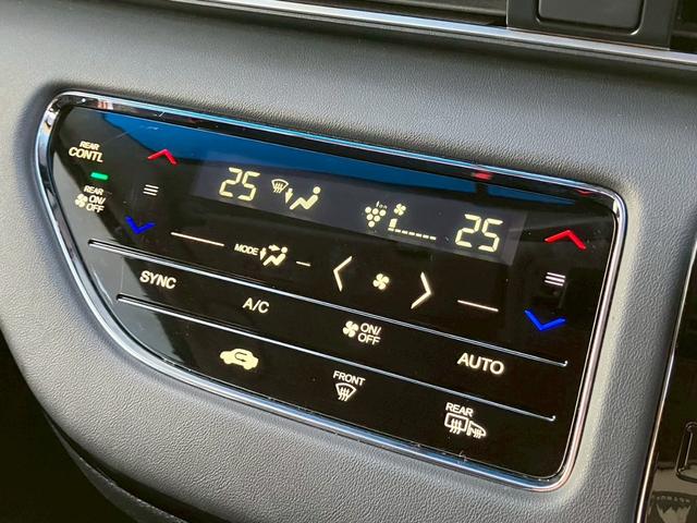 オデッセイハイブリッド ｅ：ＨＥＶアブソルート・ＥＸ　純正１０インチナビ　全周囲カメラ　フルセグＴＶ　Ｂｌｕｅｔｏｏｔｈ　純正後部座席モニター　ＡＣＣ　ドラレコ　両側電動スライドドア　パワーバックドア　Ｐシート　シートヒーター　Ｐアシスト　オットマン（14枚目）