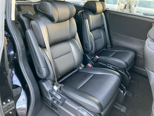 オデッセイハイブリッド ｅ：ＨＥＶアブソルート・ＥＸ　純正１０インチナビ　全周囲カメラ　フルセグＴＶ　Ｂｌｕｅｔｏｏｔｈ　純正後部座席モニター　ＡＣＣ　ドラレコ　両側電動スライドドア　パワーバックドア　Ｐシート　シートヒーター　Ｐアシスト　オットマン（29枚目）