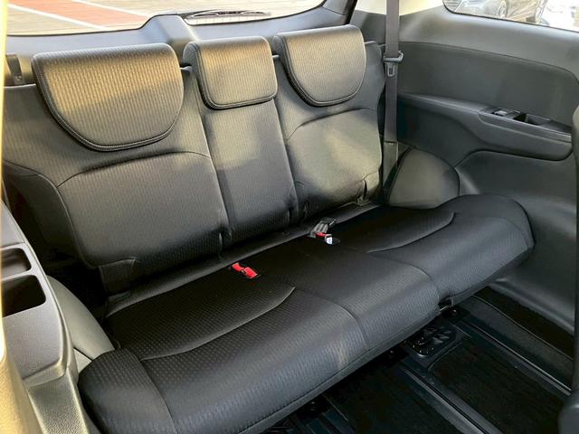 オデッセイハイブリッド ｅ：ＨＥＶアブソルート・ＥＸ　純正１０インチナビ　全周囲カメラ　フルセグＴＶ　Ｂｌｕｅｔｏｏｔｈ　純正後部座席モニター　ＡＣＣ　ドラレコ　両側電動スライドドア　パワーバックドア　Ｐシート　シートヒーター　Ｐアシスト　オットマン（30枚目）