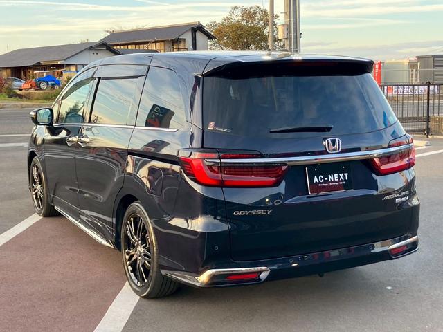 オデッセイハイブリッド ｅ：ＨＥＶアブソルート・ＥＸ　純正１０インチナビ　全周囲カメラ　フルセグＴＶ　Ｂｌｕｅｔｏｏｔｈ　純正後部座席モニター　ＡＣＣ　ドラレコ　両側電動スライドドア　パワーバックドア　Ｐシート　シートヒーター　Ｐアシスト　オットマン（39枚目）