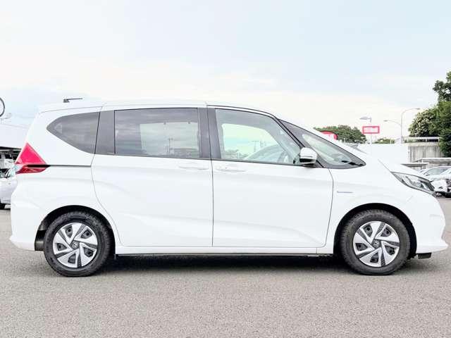フリードハイブリッド ハイブリッド・Ｇホンダセンシング　禁煙車／ホンダセンシング／両側電動スライドドア／アダブティブクルーズコントロール／ギャザーズナビ／フルセグＴＶ／ＤＶＤ／Ｂｌｕｅｔｏｏｔｈ対応／バックカメラ／ＬＥＤヘッドライト／スマートキー／ＥＴＣ／（8枚目）