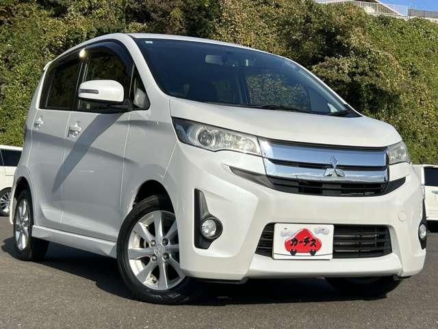 ｅＫカスタム Ｇ　４ＷＤ／純正ＳＤナビ／バックカメラ／フルセグＴＶ／ディスチャージヘッドライト／フォグランプ／シートヒーター／アイドリングストップ／純正１４インチアルミ／Ｂｌｕｅｔｏｏｔｈ（3枚目）