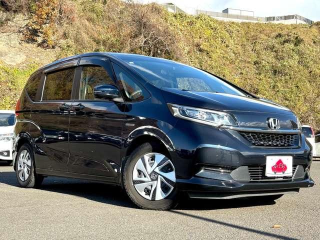フリードハイブリッド ハイブリッド・Ｇホンダセンシング　ホンダセンシング！ギャザーズナビ＆フルセグＴＶ＆ＤＶＤ＆ＢＴ＆バックカメラ！ＬＥＤヘッドライト！オートライト！シートヒーター！両側パワースライドドア！純正ＥＴＣ！スマートキーシステム（3枚目）