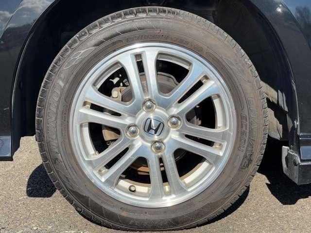 N-BOXカスタム G・Lパッケージ 禁煙車/純正Gathersナビ/CD&DVD/純正14インチアルミ/HIDヘッドライト/オートライト/横滑り防止/チップアップシート/電動格納ミラー/ETC/スマートキー(11枚目)