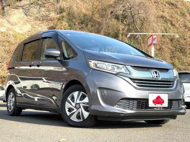 フリードハイブリッド 1.5ハイブリッドGホンダセンシング 6名 ホンダセンシング!ギャザーズナビ&フルセグTV&DVD&BT&バックカメラ!ギャザーズフリップダウンモニター!両側パワースライドドア!LEDヘッドライト!オートライト!純正ETC!(3枚目)