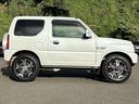 ジムニー ランドベンチャー　４ＷＤ　４ＷＤ！５速ＭＴ！禁煙！ＢＴ！フルセグＴＶ！ＥＴＣ！シートヒーター！スマートキー＆プッシュスタート！ＬＥＤライト！！ＢＡＴＴＬＥＺマフラー！ＪＡＯＳスポーツカウル＆マッドガード！ＲＡＹＳ１６ＡＷ！（8枚目）