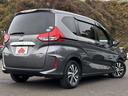 フリードハイブリッド ハイブリッド・EX 6名 ホンダセンシング!純正ナビ&フルセグTV&BT&バックカメラ!LEDヘッドライト!オートライト!純正アルミ!ハーフレザーシート!シートヒーター!両側パワースライドドア!純正ETC!ハーフレザー 中古車画像_4