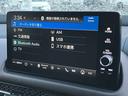 e:HEV Z マルーン本革/9型ホンダコネクトナビ&マルチビュー/BOSE12スピーカー/ホンダセンシング/渋滞時追従クルーズ/ハンズフリー電動テール/ワイヤレス充電/ETC2.0/ハンドルヒーター/パワーシート(57枚目)