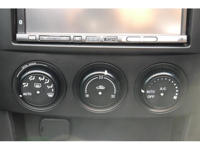 ロードスター ＲＳ　６ＭＴ　幌新品張替え済　新品夏タイヤ　ＨＫＳマフラー　スマートキー　純正キセノンヘッドライト　社外ＨＤＤナビ　フルセグ　Ｂｌｕｅｔｏｏｔｈハンズフリー　ＭＯＭＯステアリング　１７インチアルミホイール（22枚目）