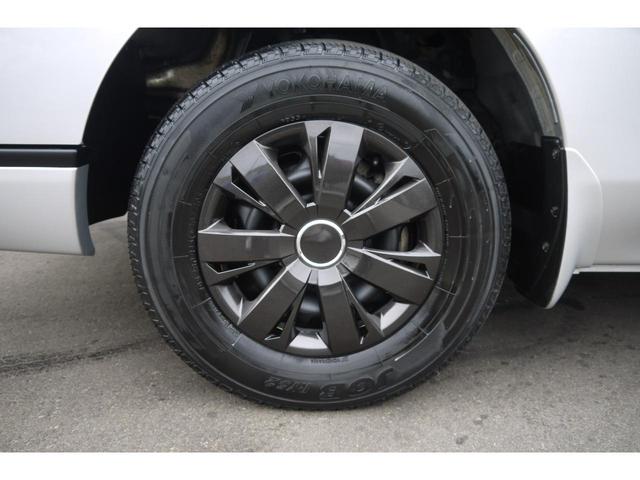 NV350キャラバンバン ロングDXターボ 4WD ディーゼルターボ 低床 リアヒーター プライバシーガラス 両側スライドドア Bluetooth対応純正メモリーナビ ハンズフリー バックカメラ キーレス 社外ブラックホイールキャップ(47枚目)