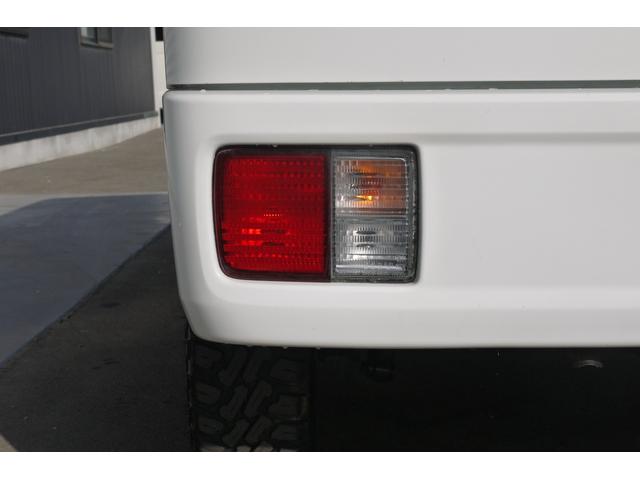 ＮＶ１００クリッパーバン ＧＸ　４ＷＤ　エマージェンシーブレーキ　ＬＥＤヘッドライト　Ｂｌｕｅｔｏｏｔｈ対応社外メモリーナビ　リアヒーター　オーバーヘッドシェルフ　社外１４インチアルミホイール　Ｍ／Ｔタイヤ　リフトアップ　ＥＴＣ（19枚目）