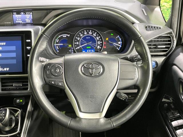 ヴォクシー ハイブリッドZS 煌III 純正10型ナビ 衝突軽減 両側電動スライド ETC シートヒーター LEDヘッド 純正16インチアルミ クルーズコントロール スマートキー オートエアコン 車線逸脱警報 ステアリングスイッチ(12枚目)