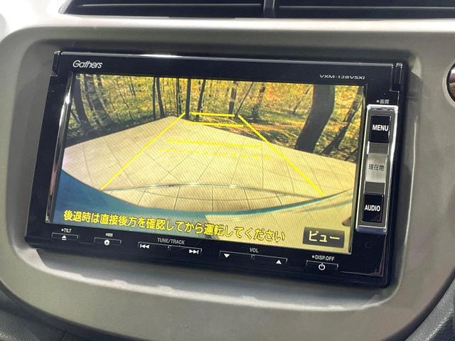 フィットハイブリッド スマートセレクション 純正ナビ バックカメラ ビルトインETC クルーズコントロール スマートキー オートエアコン 横滑り防止装置 電動格納ミラー ステアリングスイッチ シートリフター アームレスト 地デジ CD・DVD(4枚目)