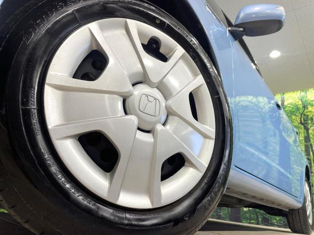 フィットハイブリッド スマートセレクション 純正ナビ バックカメラ ビルトインETC クルーズコントロール スマートキー オートエアコン 横滑り防止装置 電動格納ミラー ステアリングスイッチ シートリフター アームレスト 地デジ CD・DVD(13枚目)