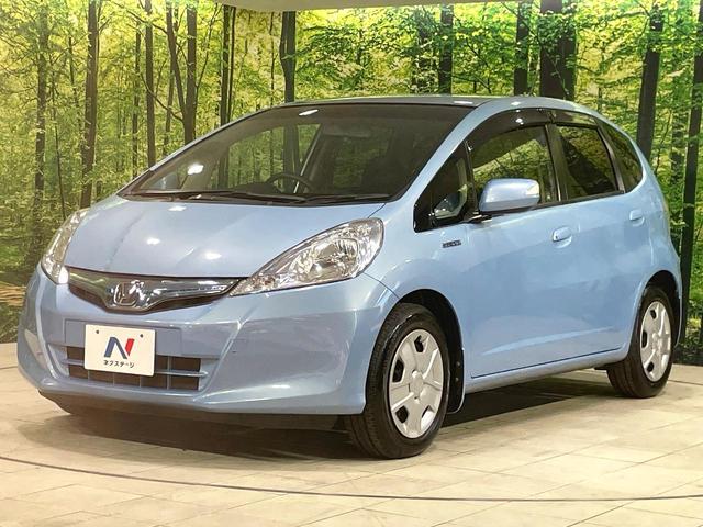 フィットハイブリッド スマートセレクション 純正ナビ バックカメラ ビルトインETC クルーズコントロール スマートキー オートエアコン 横滑り防止装置 電動格納ミラー ステアリングスイッチ シートリフター アームレスト 地デジ CD・DVD(24枚目)