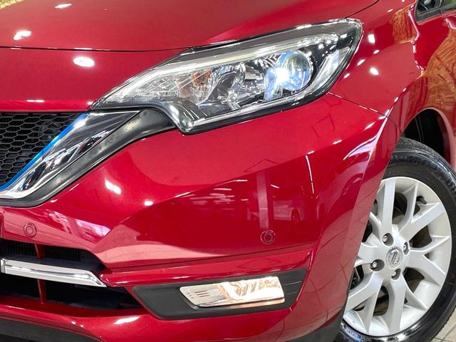 ノート e-パワー メダリスト 純正ナビ 禁煙車 衝突軽減装置 全周囲カメラ デジタルインナーミラー ETC ドラレコ ハーフレザーシート 車線逸脱警報 オートエアコン LEDヘッド オートライト 横滑防止装置 ステアリングスイッチ(12枚目)