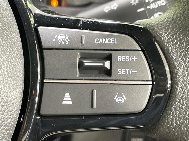 N-BOXカスタム ベースグレード 届出済未使用車 両側電動スライド ホンダセンシング レーダークルーズ 禁煙車 シートヒーター コーナーセンサー スマートキー LEDヘッドライト オートハイビーム レーンキープ 車線逸脱警報(5枚目)