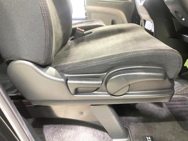 N-BOX G・Lパッケージ 純正ナビ 両側電動ドア 衝突軽減装置 バックカメラ ETC HIDヘッド オートライト オートエアコン Bluetooth接続 シートバックテーブル リアロールサンシェード 横滑り防止装置 禁煙車(35枚目)