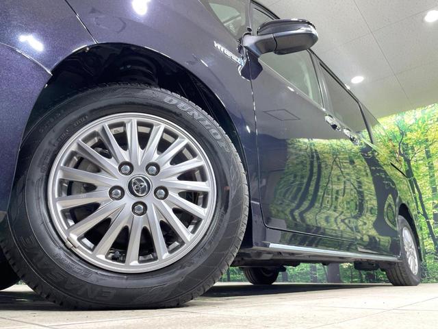 エスクァイア ハイブリッドGi 両側電動スライド 純正9インチナビ フリップダウン バックカメラ トヨタセーフティセンス 禁煙車 合皮シート シートヒーター ドラレコ スマートキー LEDヘッドライト ETC クルコン(13枚目)