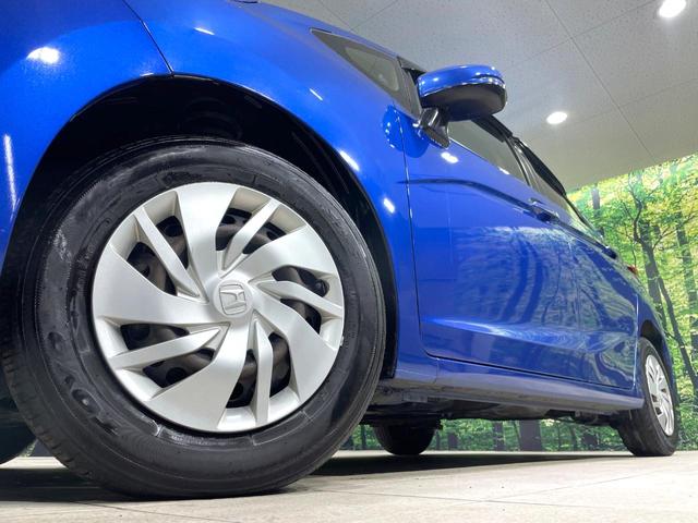 フィット １３Ｇ・Ｆパッケージ　ＳＤナビ　禁煙車　ＬＥＤヘッドライト　ＥＴＣ　スマートキー　Ｂｌｕｅｔｏｏｔｈ接続　フルセグＴＶ　ＣＤ／ＤＶＤ再生　オートエアコン　アイドリングストップ　電動格納ミラー　衝突安全ボディ（13枚目）