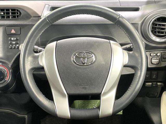 アクア G 純正SDナビ バックカメラ ドライブレコーダー ETC オートライト オートエアコン スマートキー プッシュスタート TV 禁煙車 CD再生 革巻きステアリング アームレスト 電動格納ミラー(11枚目)