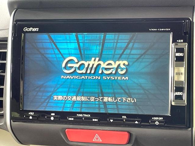 N-BOX G・Lパッケージ 電動スライドドア 純正ナビ バックカメラ 禁煙車 ドラレコ スマートキー ETC オートエアコン CD DVD再生 地デジ ステアリングスイッチ 電動格納ミラー 横滑り防止装置(4枚目)