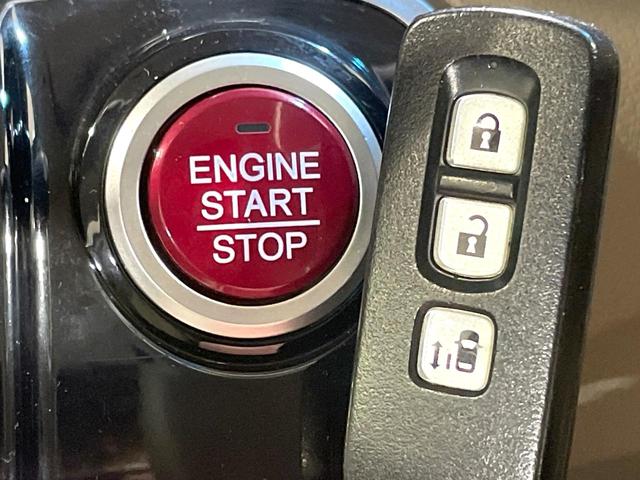 N-BOX G・Lパッケージ 電動スライドドア 純正ナビ バックカメラ 禁煙車 ドラレコ スマートキー ETC オートエアコン CD DVD再生 地デジ ステアリングスイッチ 電動格納ミラー 横滑り防止装置(6枚目)