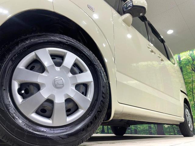 N-BOX G・Lパッケージ 電動スライドドア 純正ナビ バックカメラ 禁煙車 ドラレコ スマートキー ETC オートエアコン CD DVD再生 地デジ ステアリングスイッチ 電動格納ミラー 横滑り防止装置(13枚目)