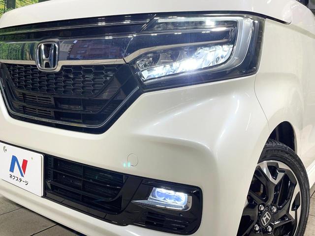 N-BOXカスタム G・Lターボホンダセンシング 純正ナビ 両側電動ドア 禁煙車 衝突軽減装置 レーダークルーズ ドラレコ ETC バックカメラ Bluetooth接続 LEDヘッド オートマチックハイビーム 純正15インチアルミホイール スマートキ(12枚目)