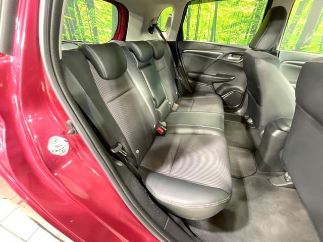 フィットハイブリッド Ｌ　ホンダセンシング　純正８型ナビ　衝突軽減装置　レーダークルーズ　禁煙　バックカメラ　ＥＴＣ　ＬＥＤヘッドライト　オートライト　オートエアコン　Ｂｌｕｅｔｏｏｔｈ接続　スマートキー　プッシュスタート　純正１５インチアルミ（9枚目）