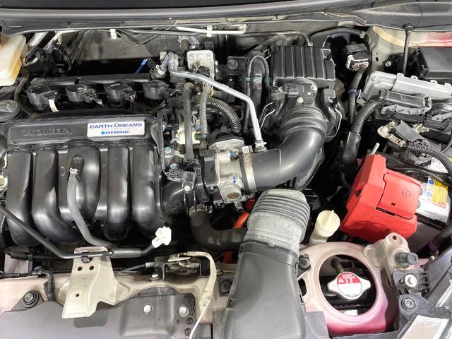 フィットハイブリッド Ｌ　ホンダセンシング　純正８型ナビ　衝突軽減装置　レーダークルーズ　禁煙　バックカメラ　ＥＴＣ　ＬＥＤヘッドライト　オートライト　オートエアコン　Ｂｌｕｅｔｏｏｔｈ接続　スマートキー　プッシュスタート　純正１５インチアルミ（18枚目）