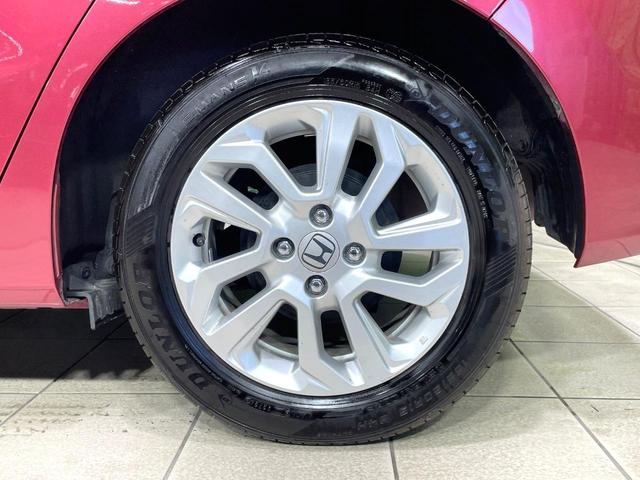 フィットハイブリッド Ｌ　ホンダセンシング　純正８型ナビ　衝突軽減装置　レーダークルーズ　禁煙　バックカメラ　ＥＴＣ　ＬＥＤヘッドライト　オートライト　オートエアコン　Ｂｌｕｅｔｏｏｔｈ接続　スマートキー　プッシュスタート　純正１５インチアルミ（28枚目）