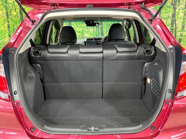 フィットハイブリッド Ｌ　ホンダセンシング　純正８型ナビ　衝突軽減装置　レーダークルーズ　禁煙　バックカメラ　ＥＴＣ　ＬＥＤヘッドライト　オートライト　オートエアコン　Ｂｌｕｅｔｏｏｔｈ接続　スマートキー　プッシュスタート　純正１５インチアルミ（35枚目）