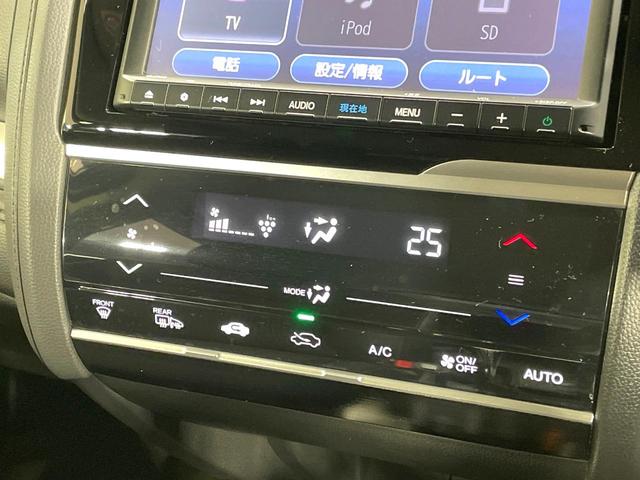 フィットハイブリッド Ｌ　ホンダセンシング　純正８型ナビ　衝突軽減装置　レーダークルーズ　禁煙　バックカメラ　ＥＴＣ　ＬＥＤヘッドライト　オートライト　オートエアコン　Ｂｌｕｅｔｏｏｔｈ接続　スマートキー　プッシュスタート　純正１５インチアルミ（49枚目）