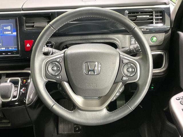 ステップワゴンスパーダ ｅ：ＨＥＶスパーダ　Ｇ　ホンダセンシング　ハイブリッド　両側電動スライド　純正９インチナビ　ＡＣ１００Ｖ電源　ホンダセンシング　レーダークルーズ　禁煙車　コーナーセンサー　スマートキー　ＬＥＤヘッドライト　ＥＴＣ　オートマチックハイビーム（12枚目）