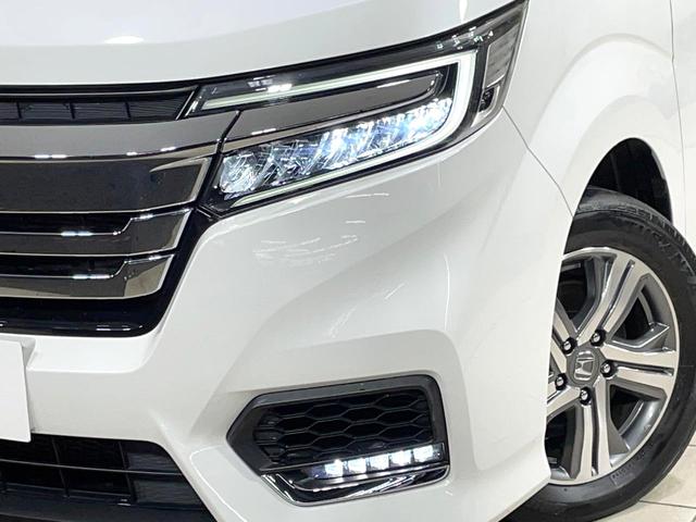 ステップワゴンスパーダ ｅ：ＨＥＶスパーダ　Ｇ　ホンダセンシング　ハイブリッド　両側電動スライド　純正９インチナビ　ＡＣ１００Ｖ電源　ホンダセンシング　レーダークルーズ　禁煙車　コーナーセンサー　スマートキー　ＬＥＤヘッドライト　ＥＴＣ　オートマチックハイビーム（14枚目）