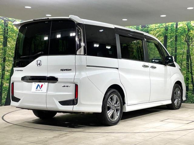 ステップワゴンスパーダ ｅ：ＨＥＶスパーダ　Ｇ　ホンダセンシング　ハイブリッド　両側電動スライド　純正９インチナビ　ＡＣ１００Ｖ電源　ホンダセンシング　レーダークルーズ　禁煙車　コーナーセンサー　スマートキー　ＬＥＤヘッドライト　ＥＴＣ　オートマチックハイビーム（18枚目）