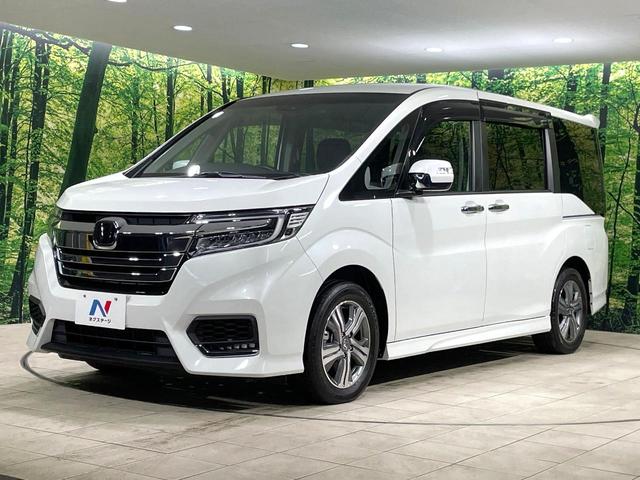 ステップワゴンスパーダ ｅ：ＨＥＶスパーダ　Ｇ　ホンダセンシング　ハイブリッド　両側電動スライド　純正９インチナビ　ＡＣ１００Ｖ電源　ホンダセンシング　レーダークルーズ　禁煙車　コーナーセンサー　スマートキー　ＬＥＤヘッドライト　ＥＴＣ　オートマチックハイビーム（27枚目）