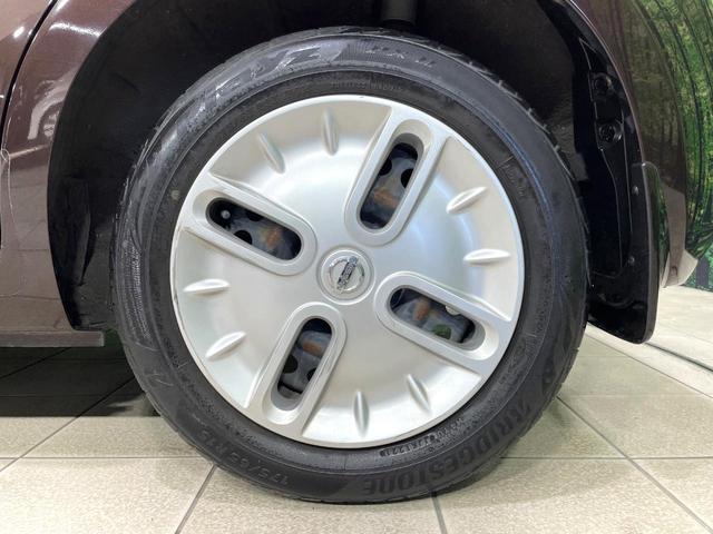 キューブ １５Ｘ　純正ナビ　バックカメラ　スマートキー　アイドリングストップ　電動格納ミラー　純正１４インチホイール　エアコン　盗難防止システム　衝突安全ボディー　プライバシーガラス　禁煙車（29枚目）