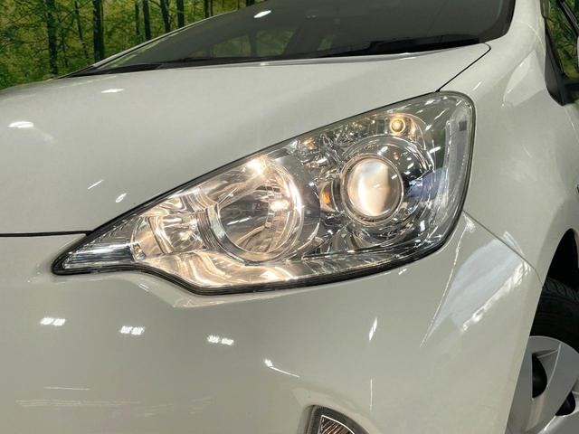 アクア L SDナビ 禁煙車 ドライブレコーダー ETC キーレスエントリー オートエアコン 電動格納ミラー スペアタイヤ 純正ホイール ウインカーミラー ヘッドライトレベライザー(12枚目)