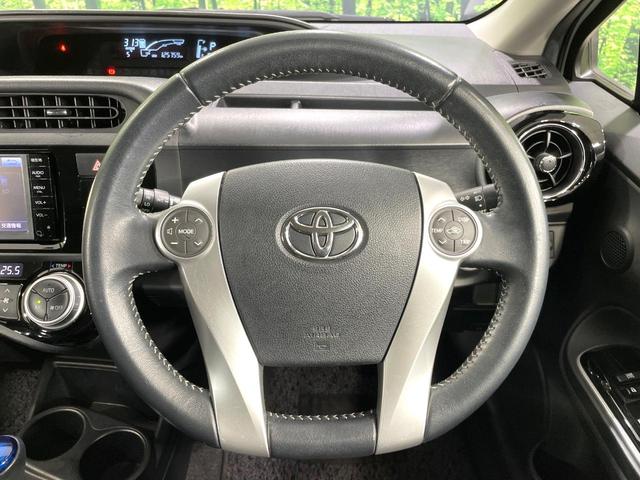 アクア Ｘ－アーバン　純正ＳＤナビ　バックカメラ　禁煙車　ハーフレザーシート　ドラレコ　スマートキー　ＬＥＤヘッド　ルーフレール　ビルトインＥＴＣ　純正１６インチアルミ　オートライト　オートエアコン　Ｂｌｕｅｔｏｏｔｈ（9枚目）