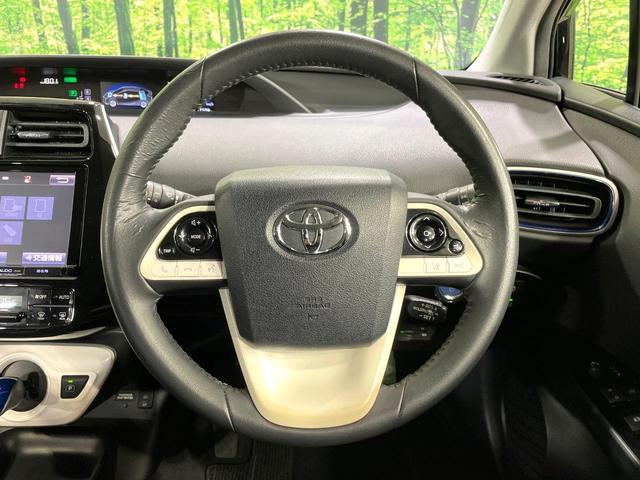 プリウス Sツーリングセレクション モデリスタエアロ 衝突軽減 レーダークルーズコントロール 純正9型ナビ バックカメラ シートヒーター LEDヘッド ETC 純正17インチアルミ スマートキー オートエアコン ステアリングスイッチ(11枚目)