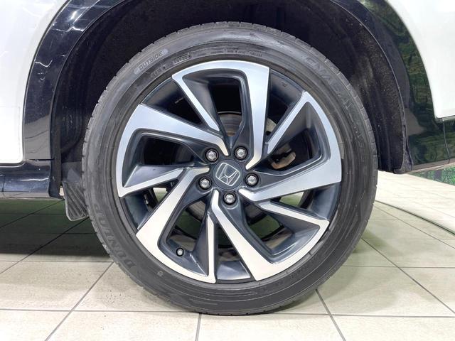 ヴェゼル ハイブリッドＲＳ・ホンダセンシング　純正ＳＤナビ　バックカメラ　衝突被害軽減システム　レーダークルーズ　禁煙車　ハーフレザーシート　スマートキー　ＬＥＤヘッド　ビルトインＥＴＣ　純正１８インチアルミ　車線逸脱警報　オートライト（28枚目）