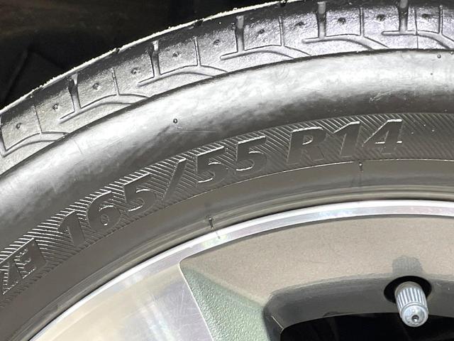 ゼストスパーク Ｗターボ　４ＷＤ　純正ナビ　バックカメラ　オートエアコン　ＨＩＤヘッドライト　フォグライト　ステアリングスイッチ　電動格納ミラー　ベンチシート　地デジＴＶ　ＣＤ／ＤＶＤ　スペアタイヤ　純正１４インチアルミ（30枚目）