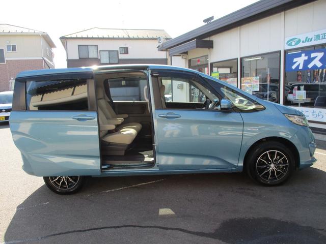 フリードハイブリッド ハイブリッド・Gホンダセンシング 4WD・禁煙車・アダプティブクルーズコントロ-ル・インタ-ナビ・フルセグ・Bluetooth・バックカメラ・ビルトインETC・両側パワースライド・LEDヘッド・LEDフォグ・運転席助手席シートヒータ-(3枚目)