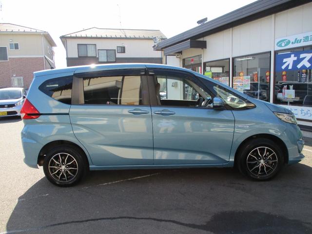 フリードハイブリッド ハイブリッド・Gホンダセンシング 4WD・禁煙車・アダプティブクルーズコントロ-ル・インタ-ナビ・フルセグ・Bluetooth・バックカメラ・ビルトインETC・両側パワースライド・LEDヘッド・LEDフォグ・運転席助手席シートヒータ-(5枚目)