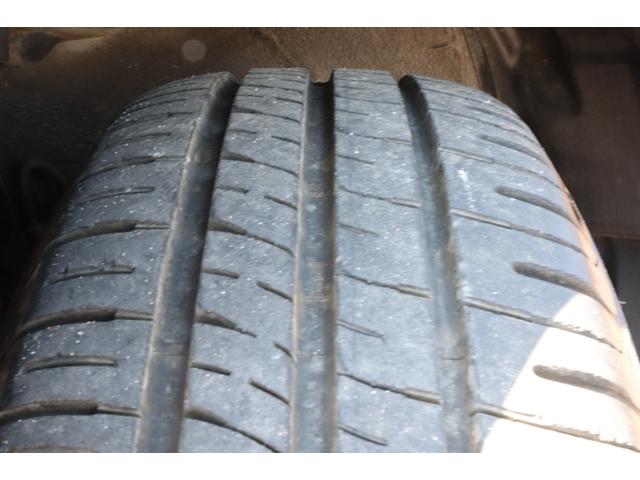 プリウス Ｌ　走行距離無制限　一年保証　車検整備付き　Ｐスタート　ＥＴＣ　盗難防止システム　Ｂカメラ　オートライト（32枚目）